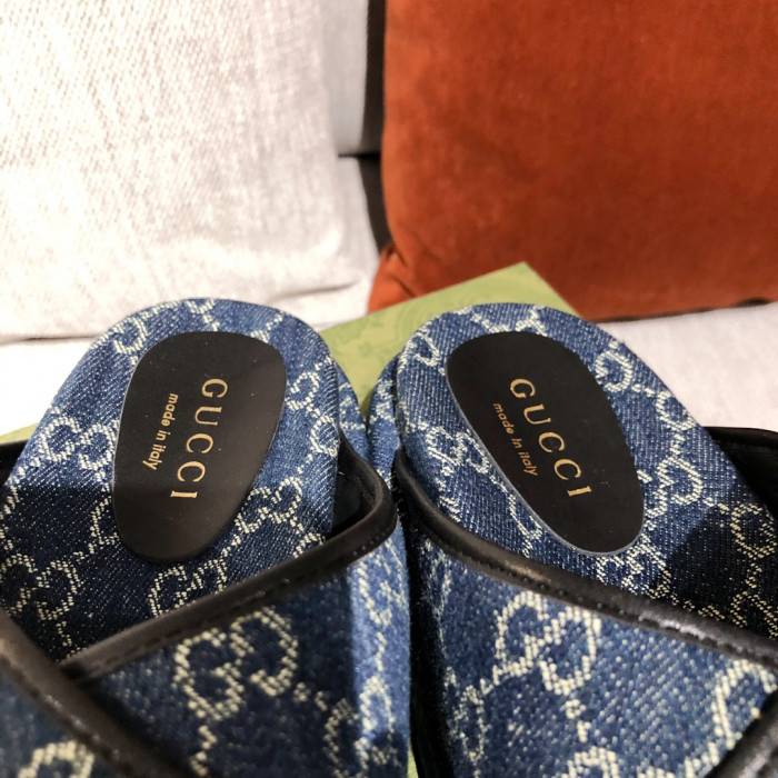 G*u*i slippers