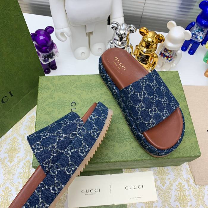 G*u*i slippers