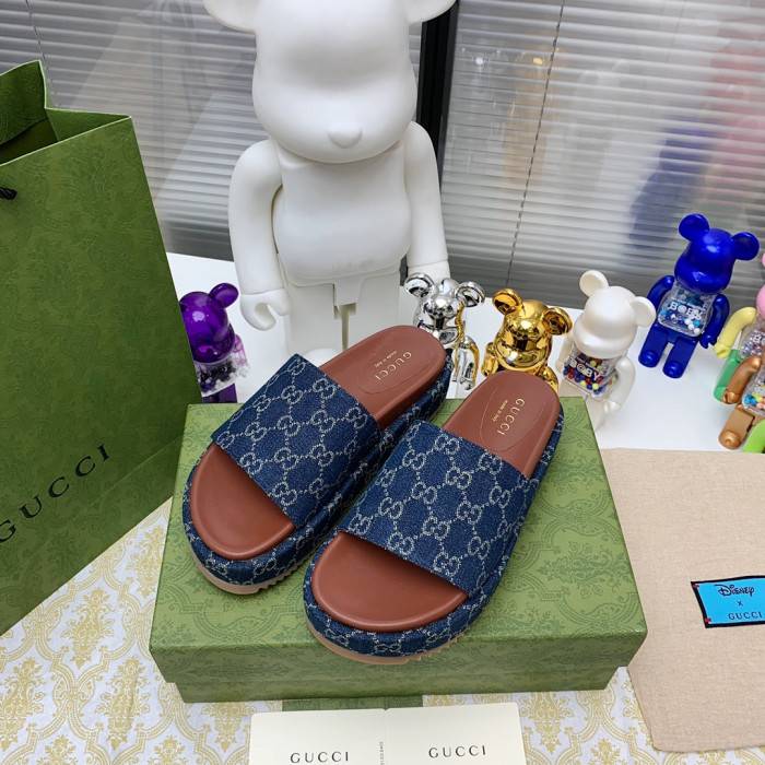 G*u*i slippers